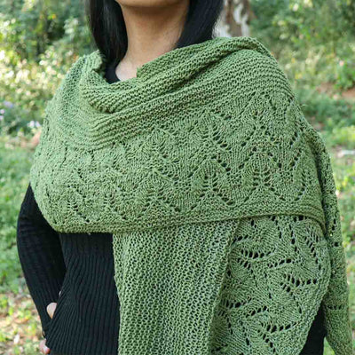 Green shawl knitting pattern using Garter stitch and Lace stitch